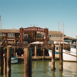 Fishing boat by a pier